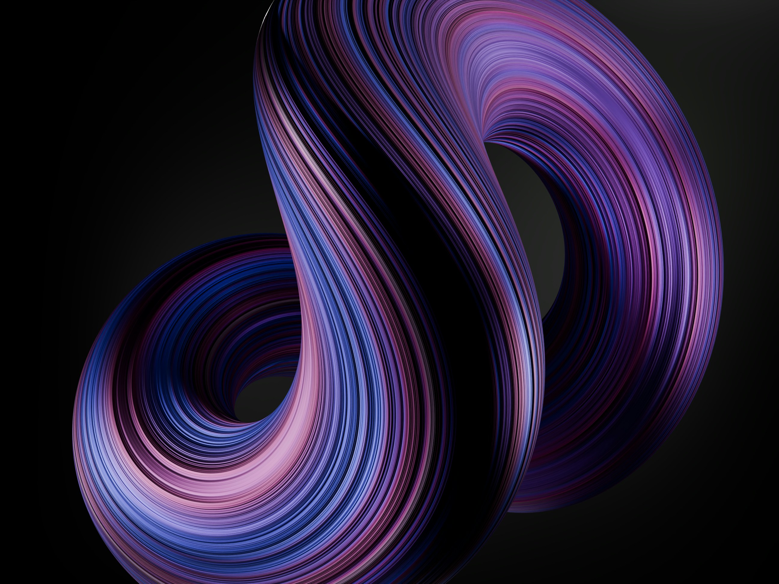 A swirling, colorful, abstract design on black.