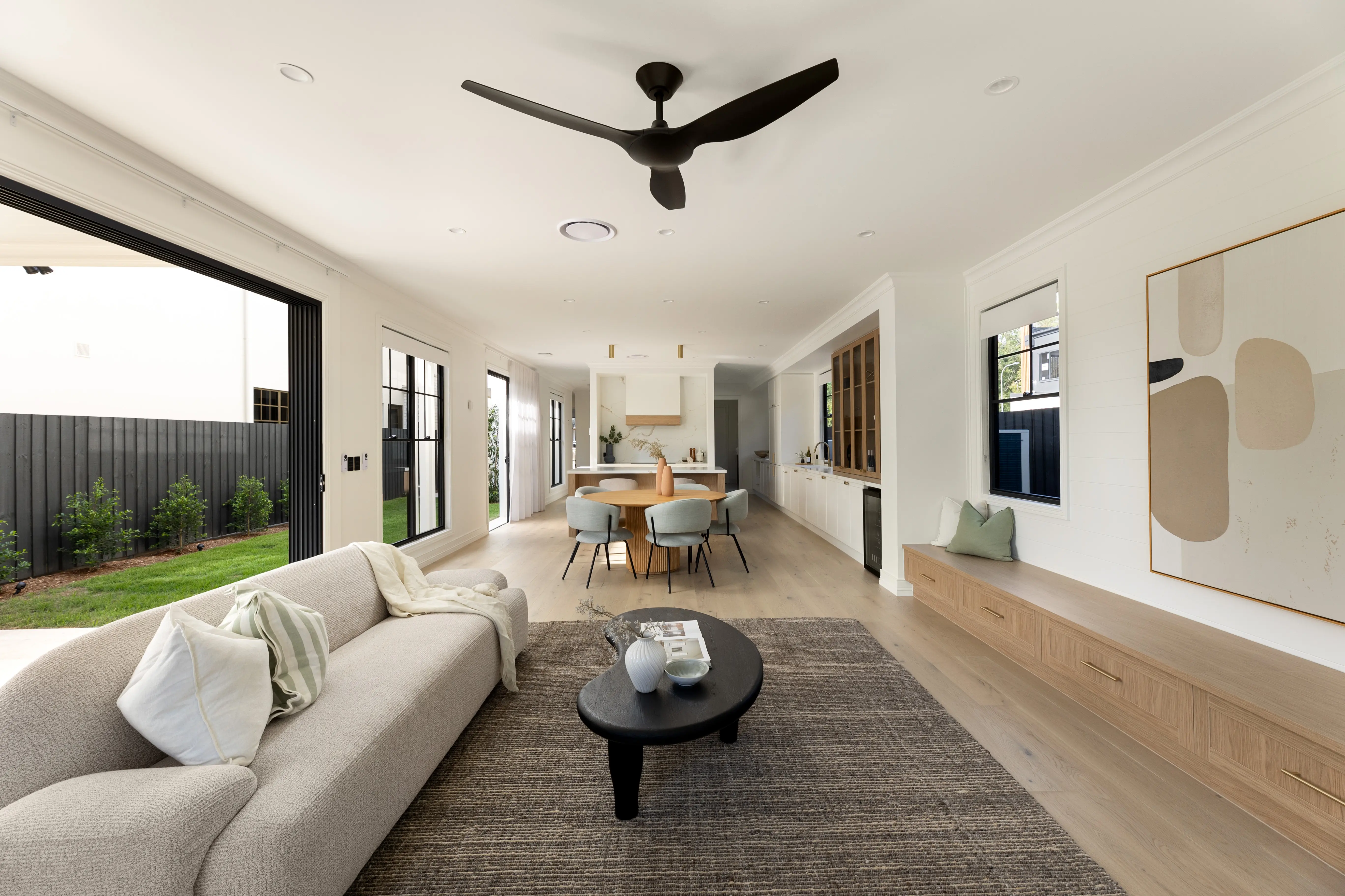 Luxury open plan design with the same flooring throughout