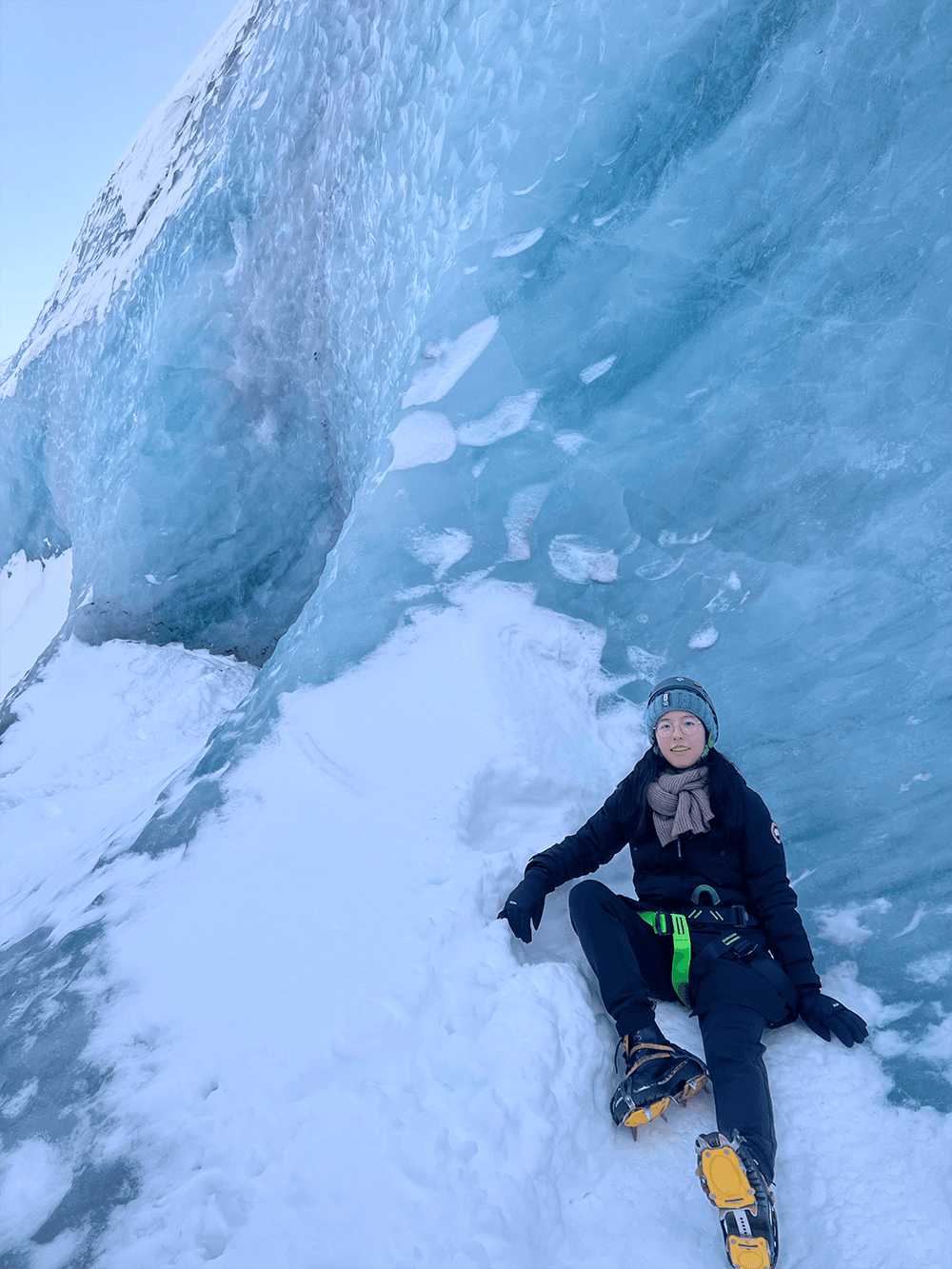 Blurry black-and-white figure in cap, white shirt, and black trousers.