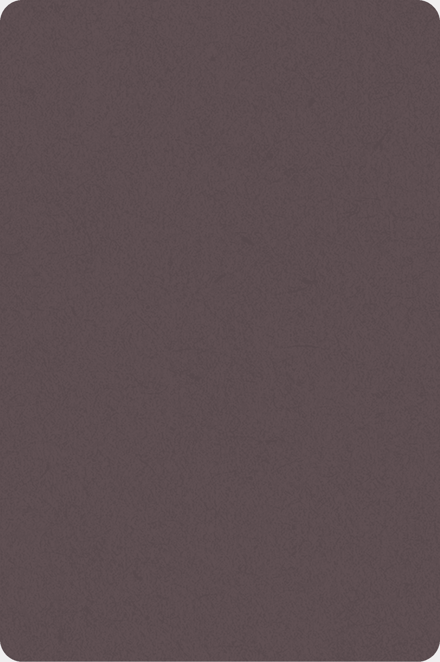 A woman in a straw hat stands in the grass