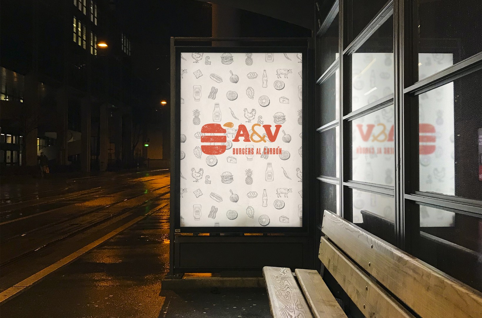 a bus stop at night with a postes of the new logo of the A&V restaurant. Light background and a pattern with illustrated ingredients