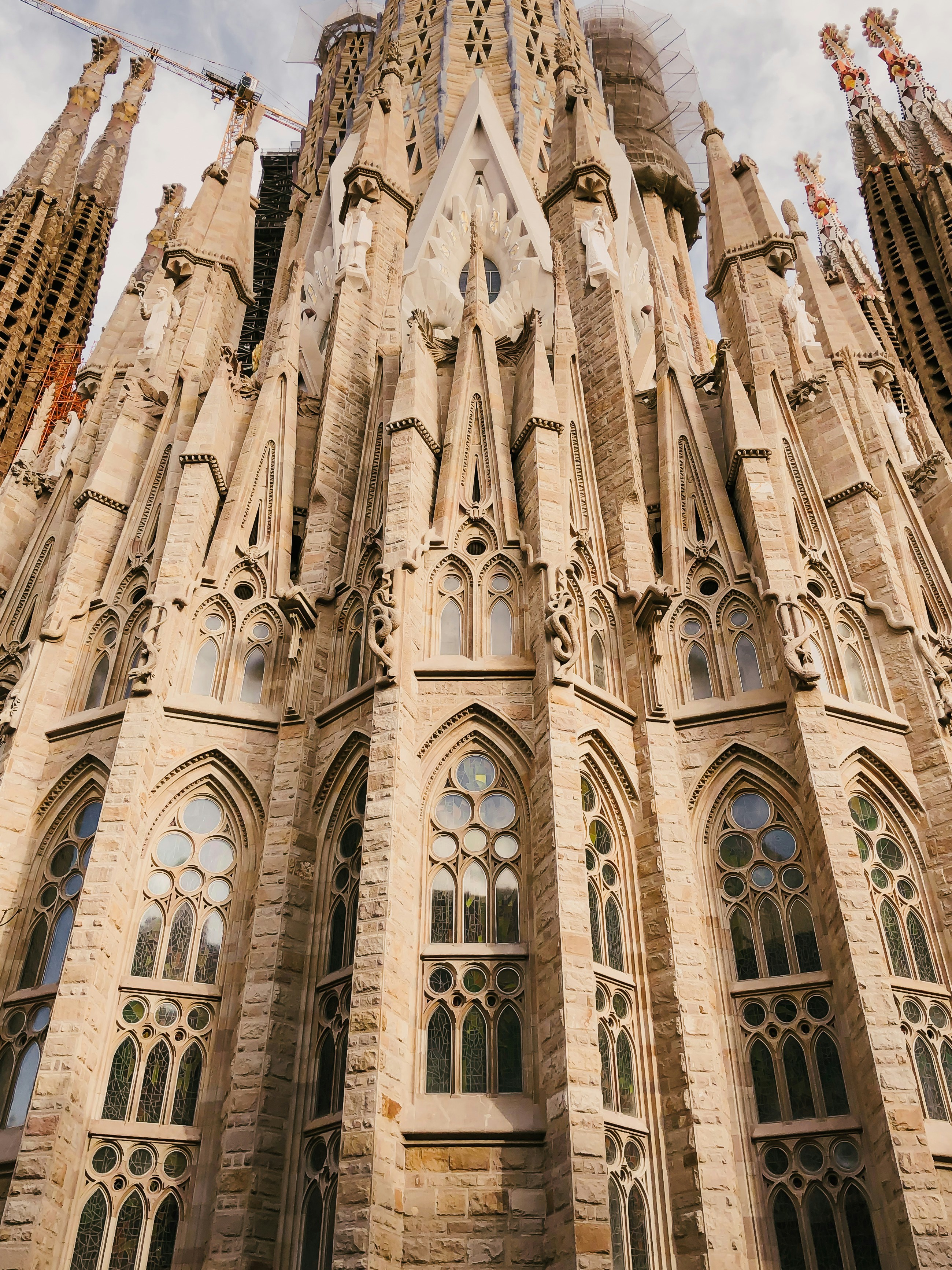 A close up of one of the decorated and ornate facades of the Sagrada Familia. 