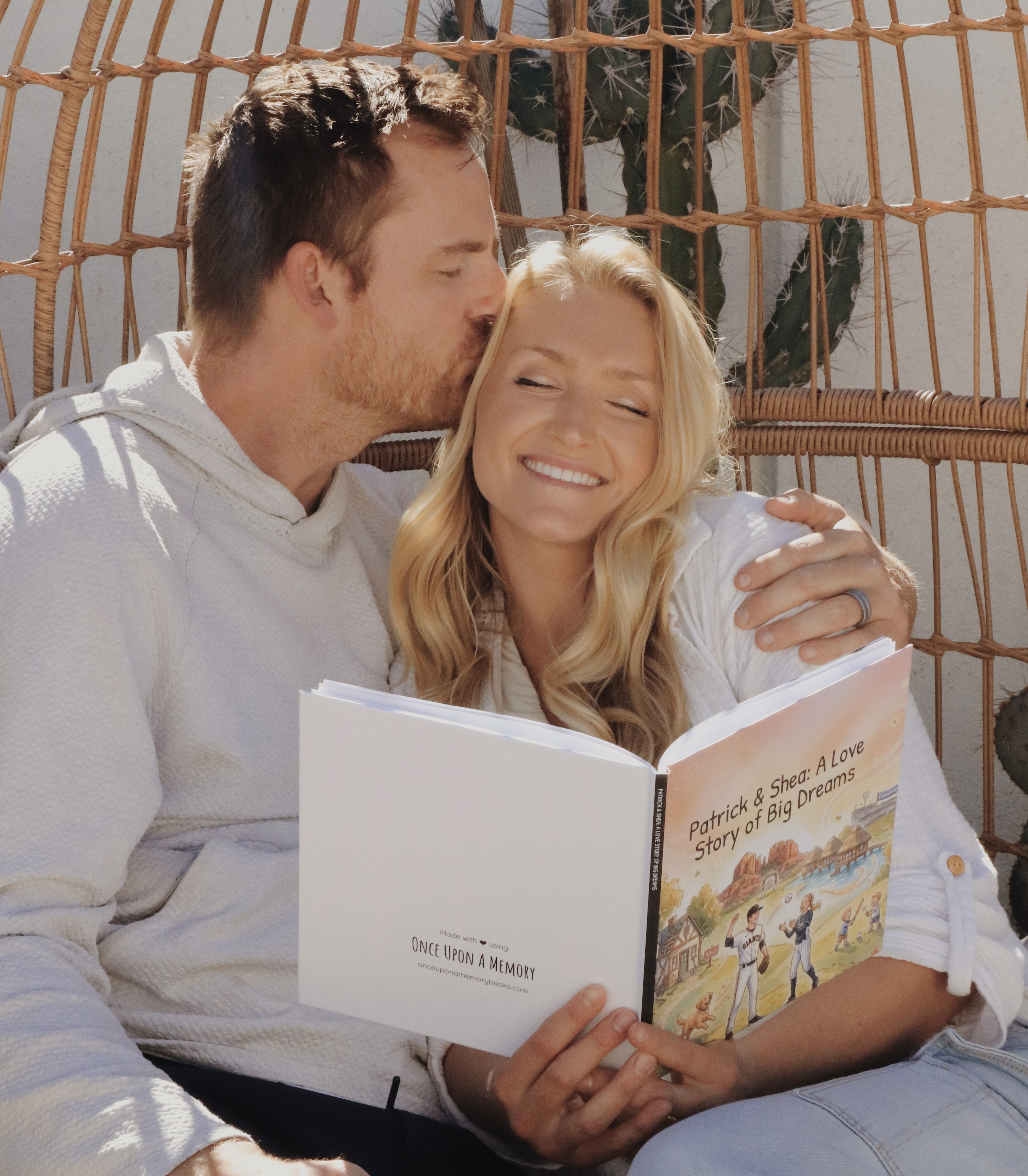 Close-up of a dark green leaf showing its textured surface and central vein against a muted background.