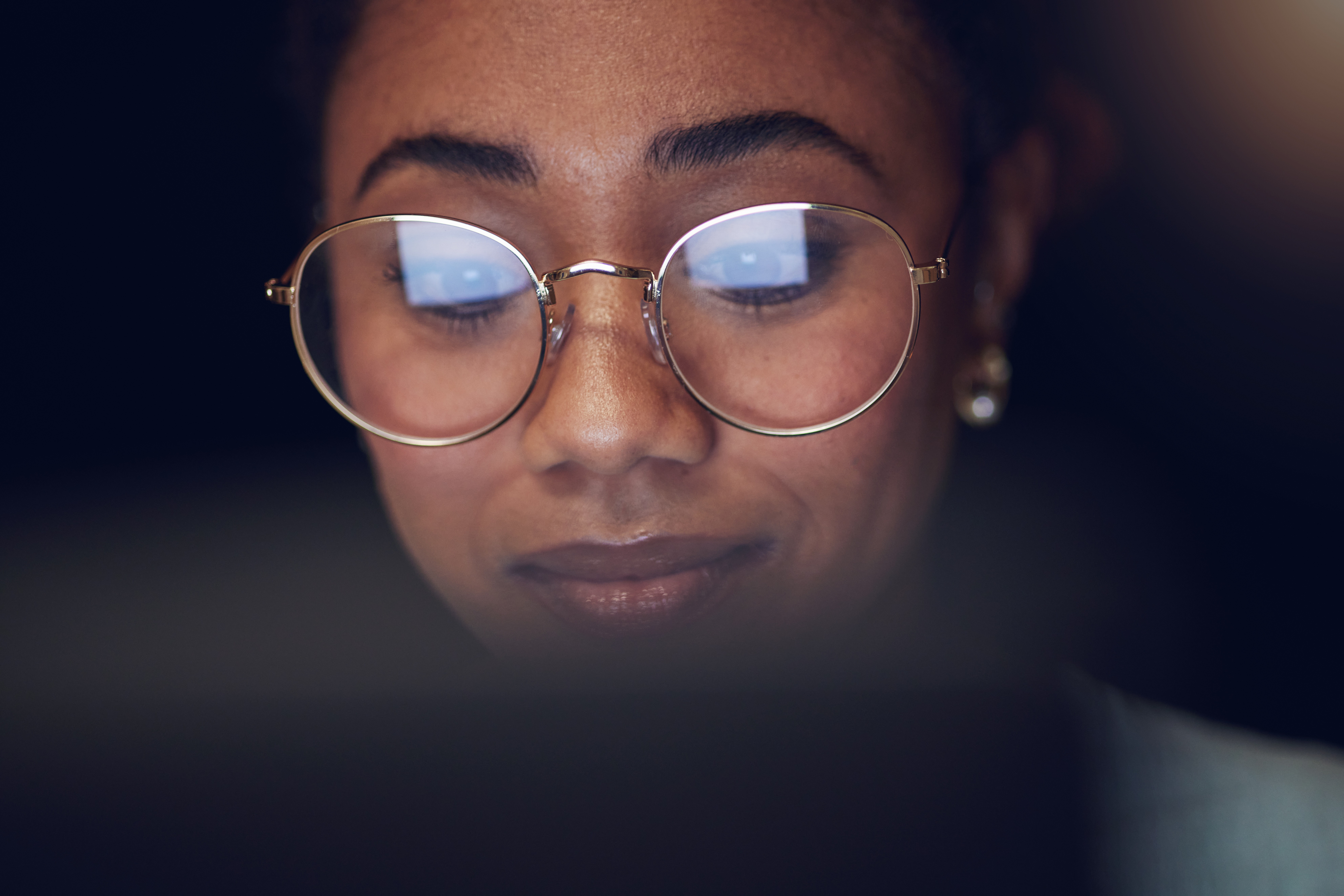 Woman looking at list of financial name changes