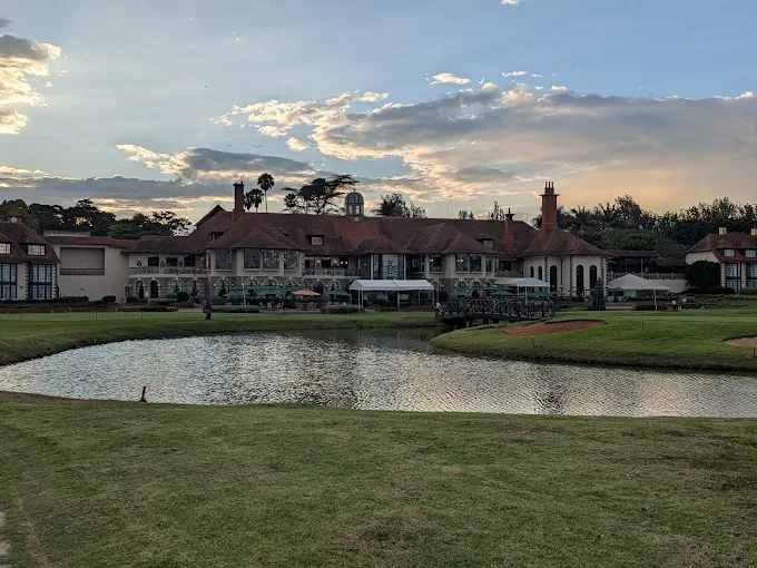 white and brown wooden house near swimming pool during daytime