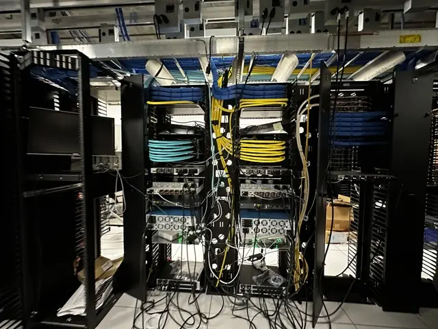 Professional data center decommission with cable removal, equipment teardown, and server rack disassembly