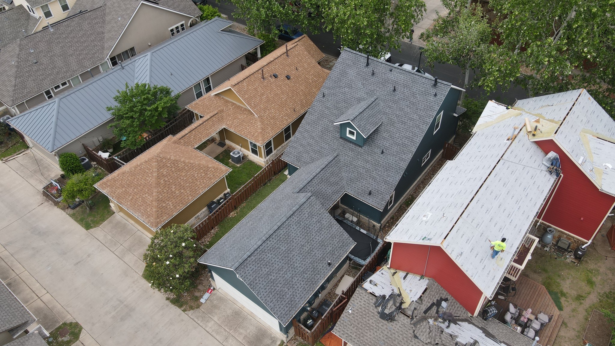 Charming gable roof installed after a hail replacement, featuring GAF HDZ Timberline architectural shingles, combining durability and aesthetic appeal.