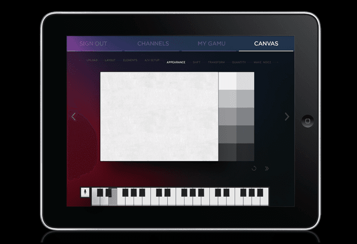 A tablet device displays a digital canvas interface with a white rectangular area in the center, divided into gray and white squares. Below the canvas, a black piano keyboard with white keys is visible. The tablet’s screen shows tabs labeled “SIGN OUT,” “CHANNELS,” “MY GAMU,” and “CANVAS,” along with other interface elements including “UPLOAD,” “LAYOUT,” “ELEMENTS,” “APPEARANCE,” “SHIFT,” “TRANSFORM,” “QUANTITY,” and “MAKE VOICE.” The tablet has a black bezel and a circular camera lens on its right side.
