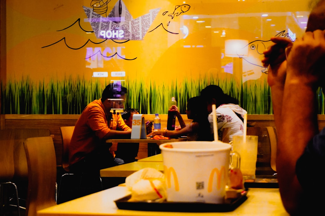 People eating at a fast food restaurant.