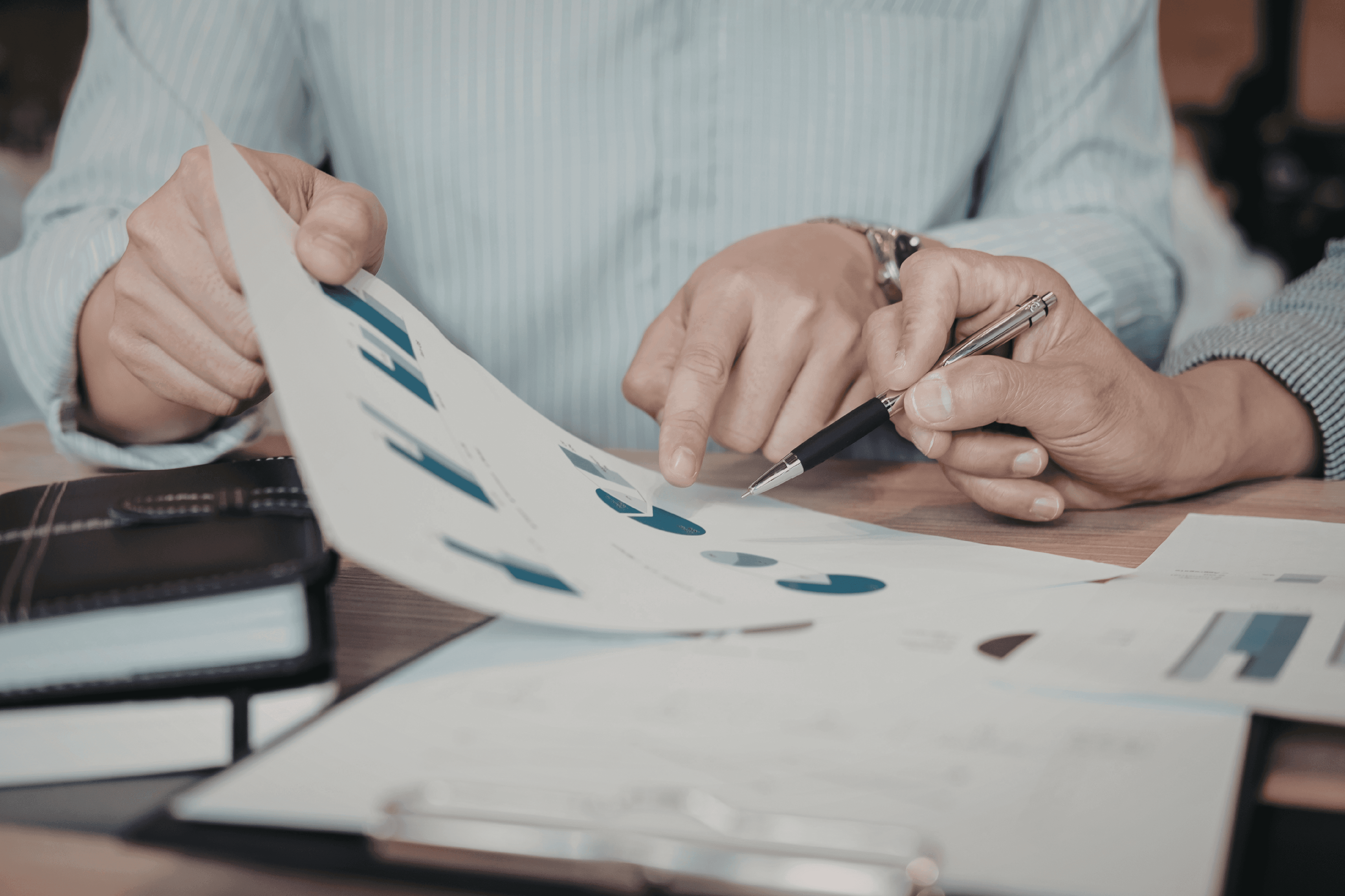 Person reviewing financial documents