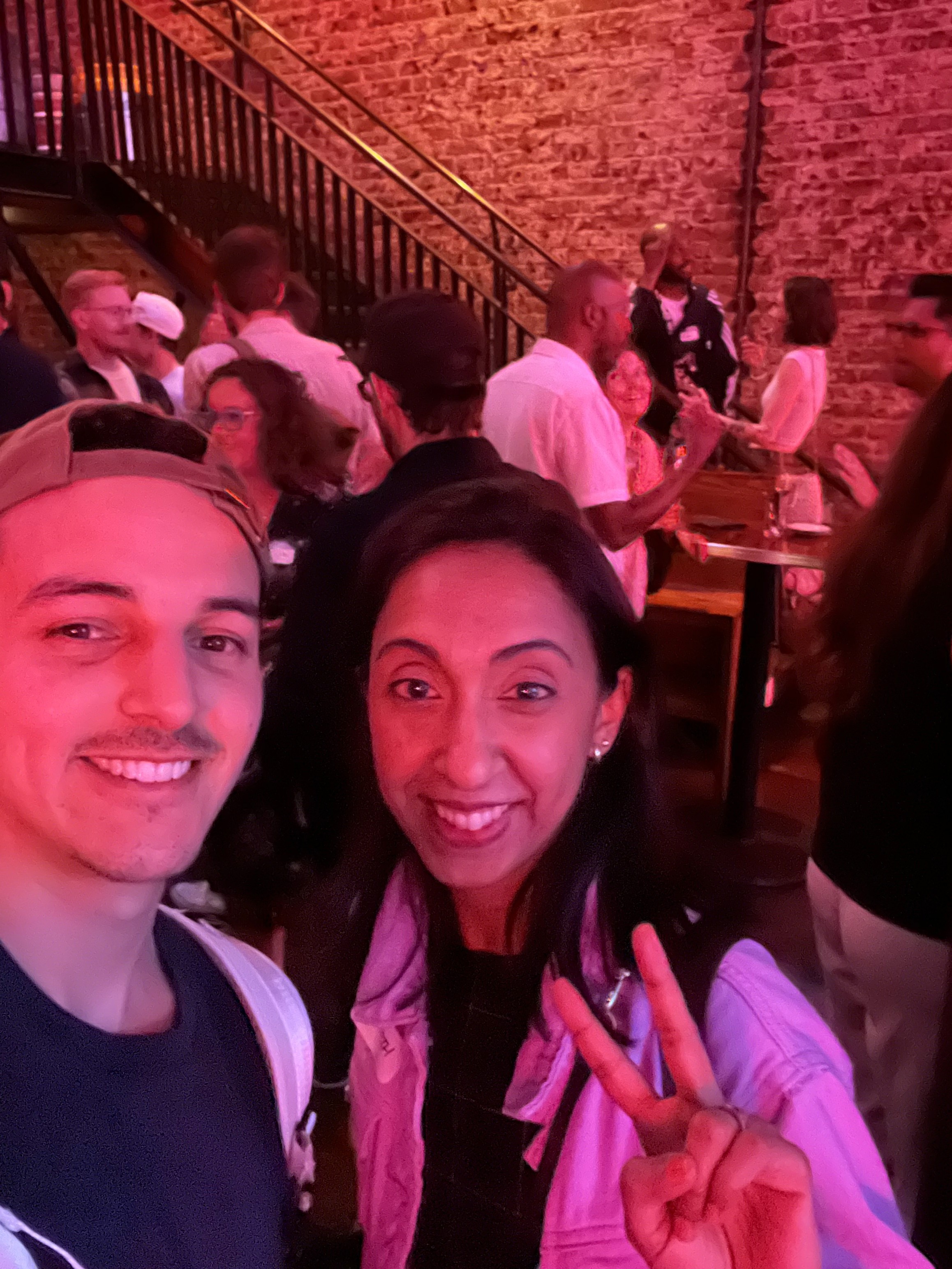 people in a large building with Tate Modern in the background
