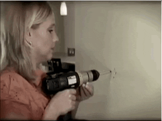 Woman DIY, shelf falling down, inside womans home