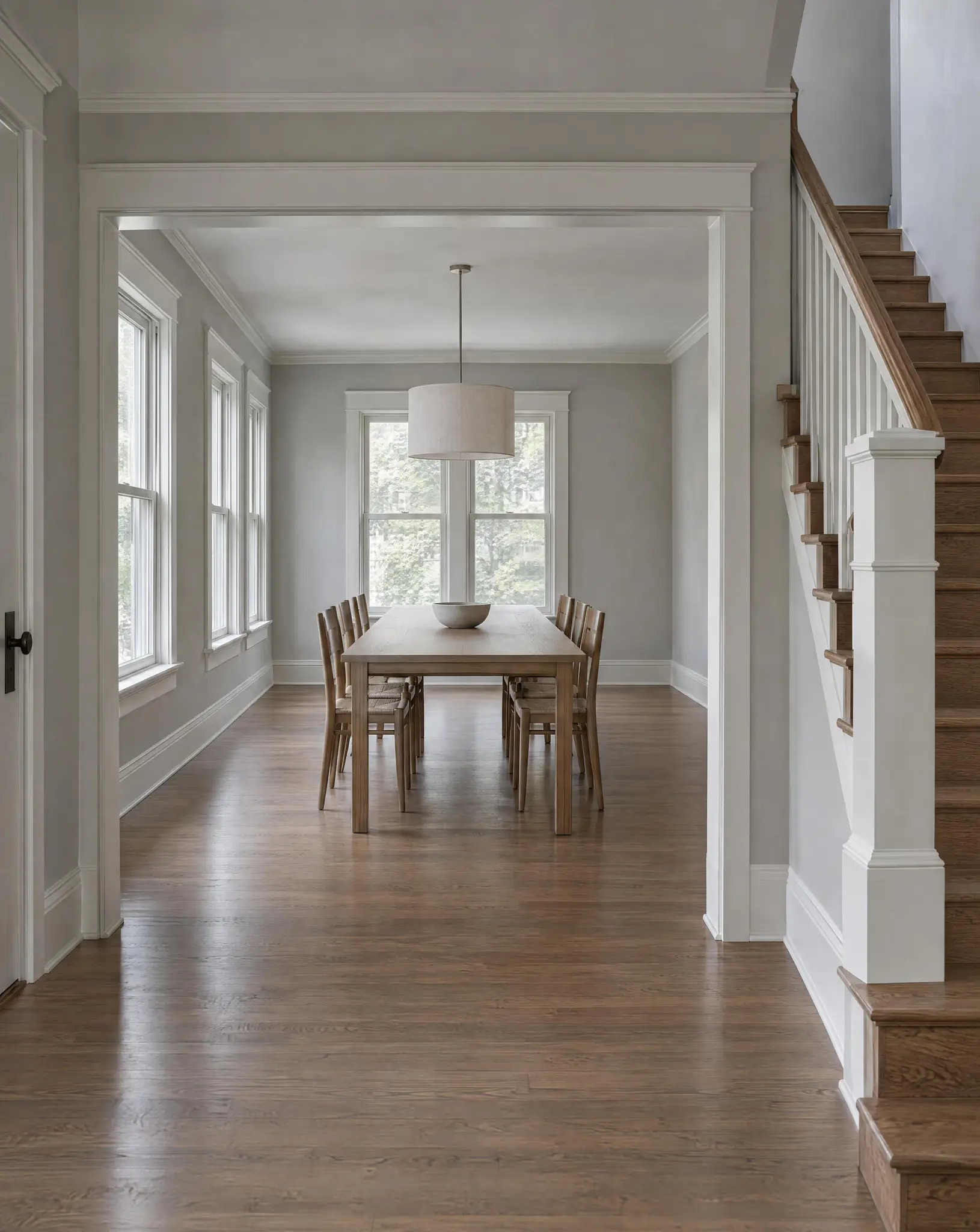 Reopened dining room of a Lowry Hill house converted from a duplex back to a single-family home, seen from the front hall