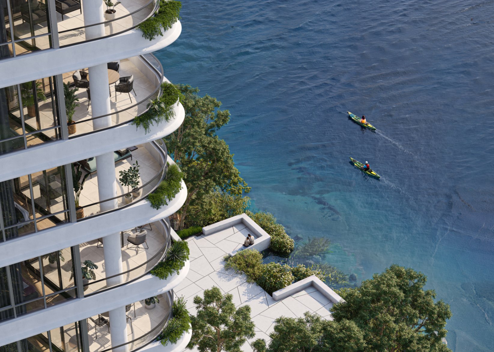 Rhodes Bay apartment building with curved balconies overlooking the river, surrounded by landscaped terraces and waterfront activity.