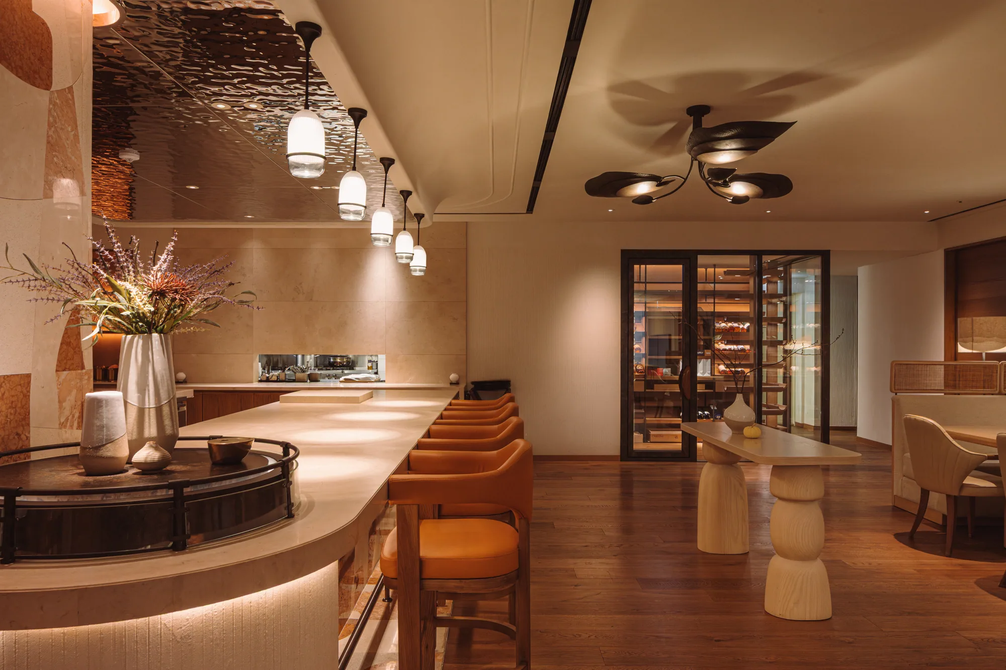 The second-floor PLAYA bar, with counter seating leading into the dining tables