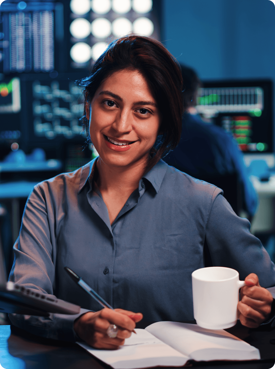 A man and a woman working in a server room 