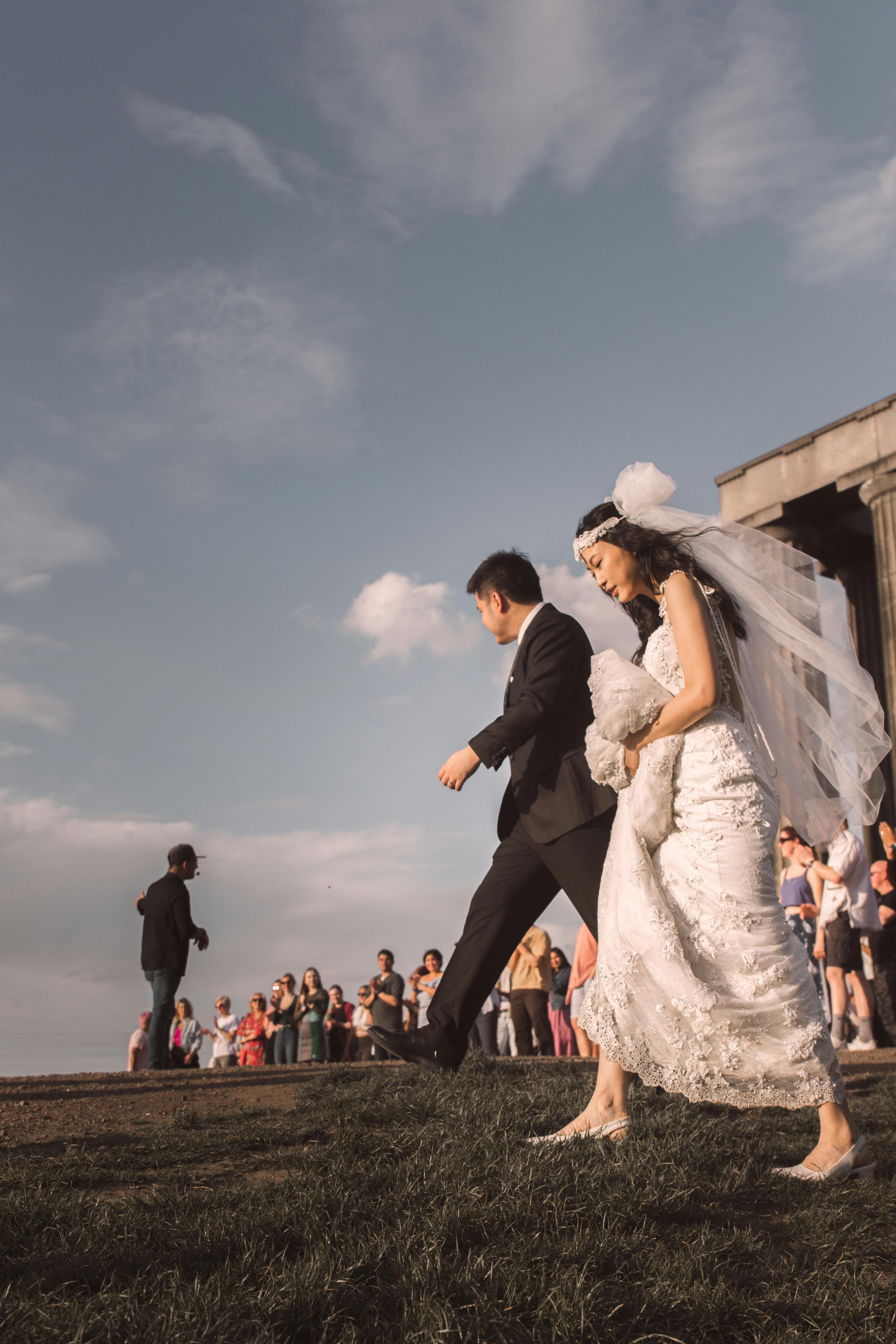 A group of people standing in front of a church