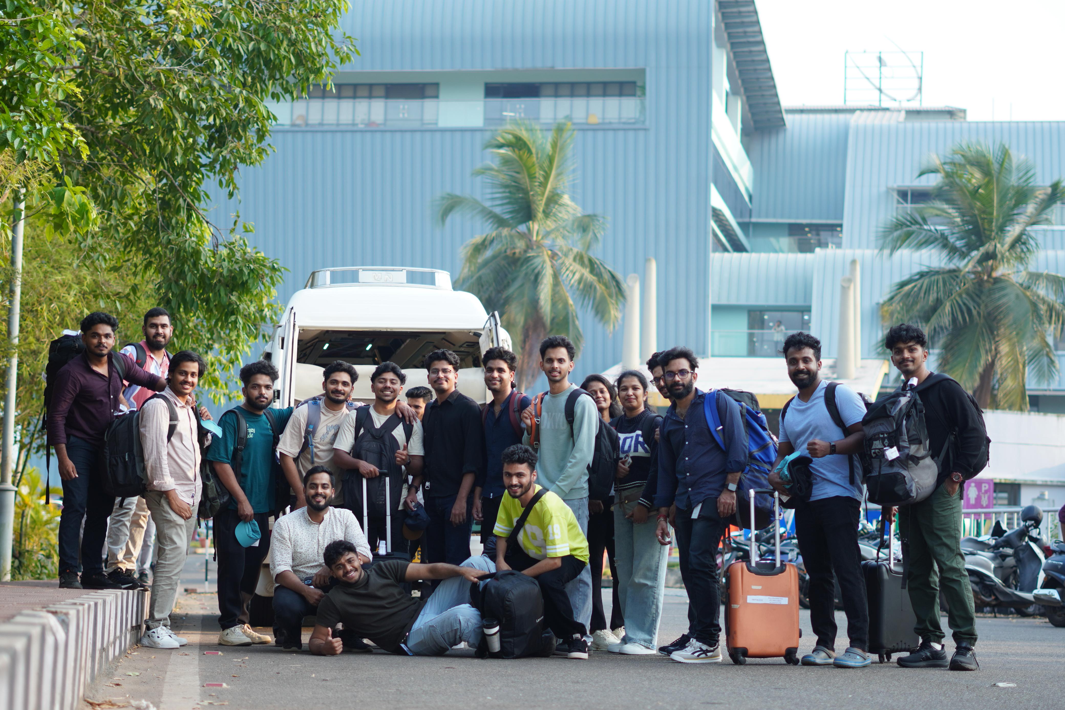 A modern home office with framed art and an aquarium.