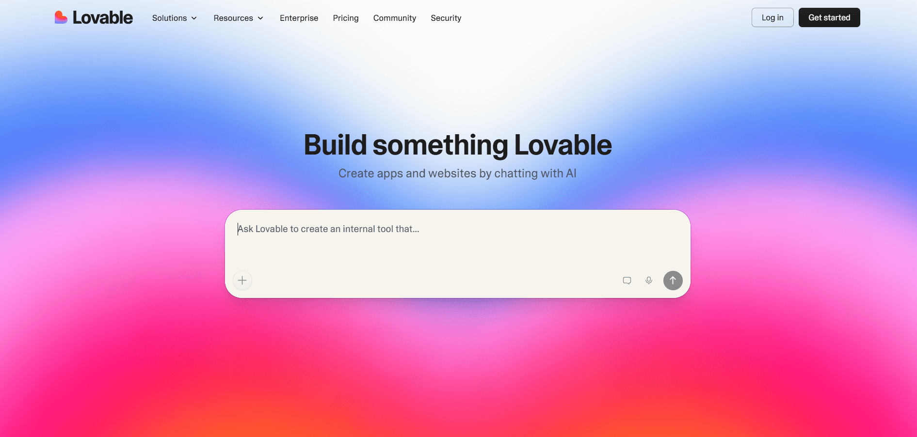 Lovable website homepage featuring an AI app creation prompt on a vibrant gradient background.