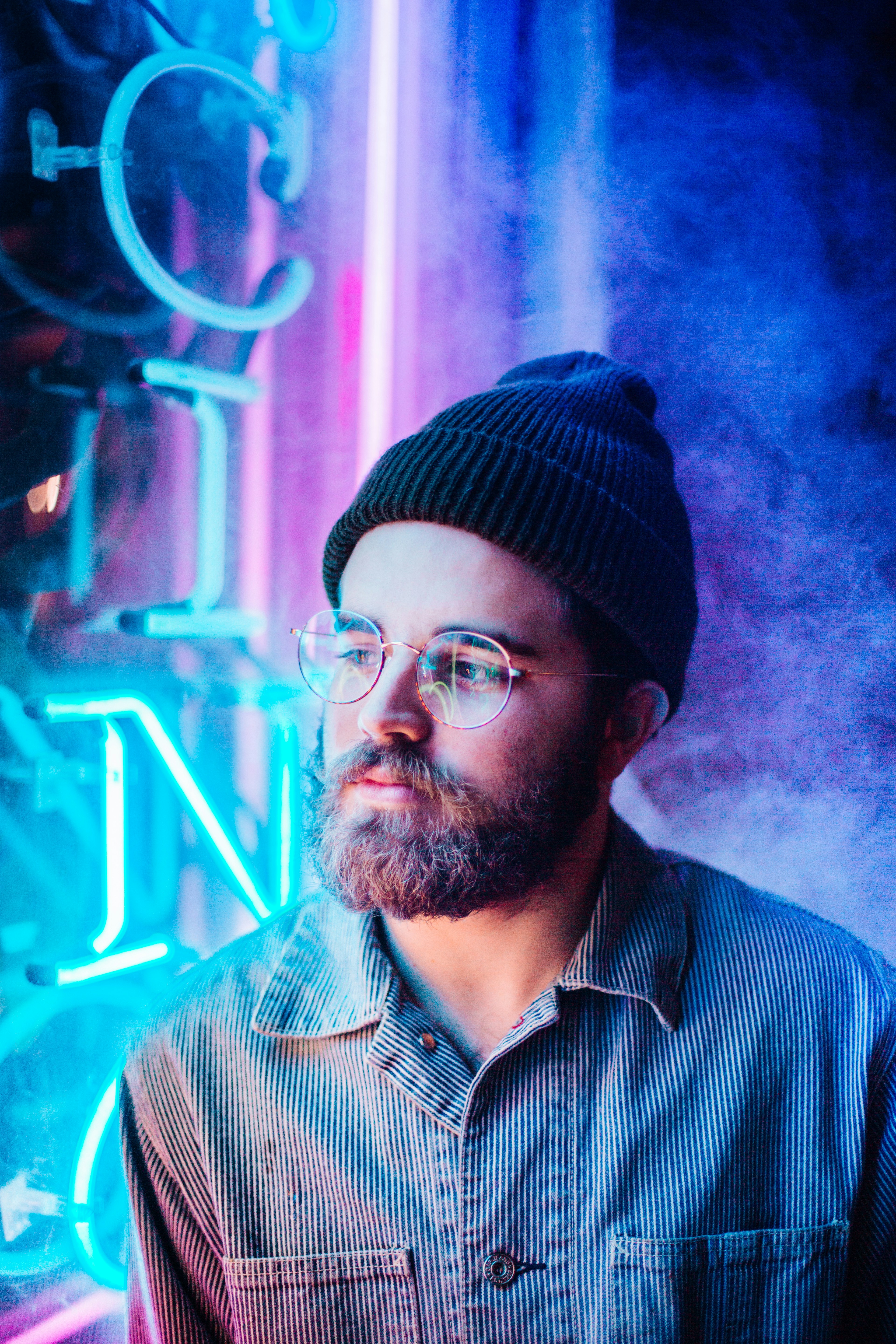 man in blue button-up shirt