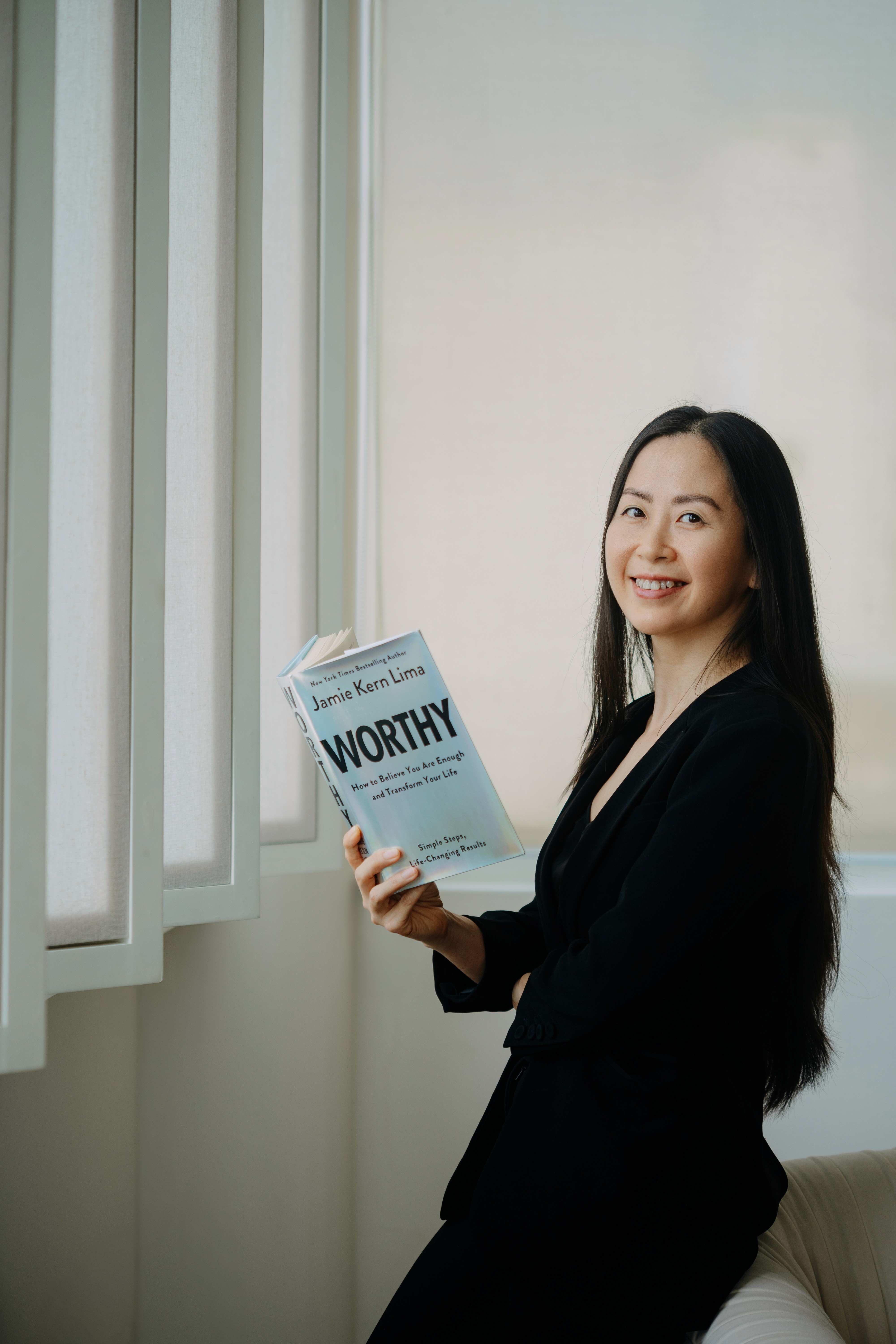 lara-duong-holding-book