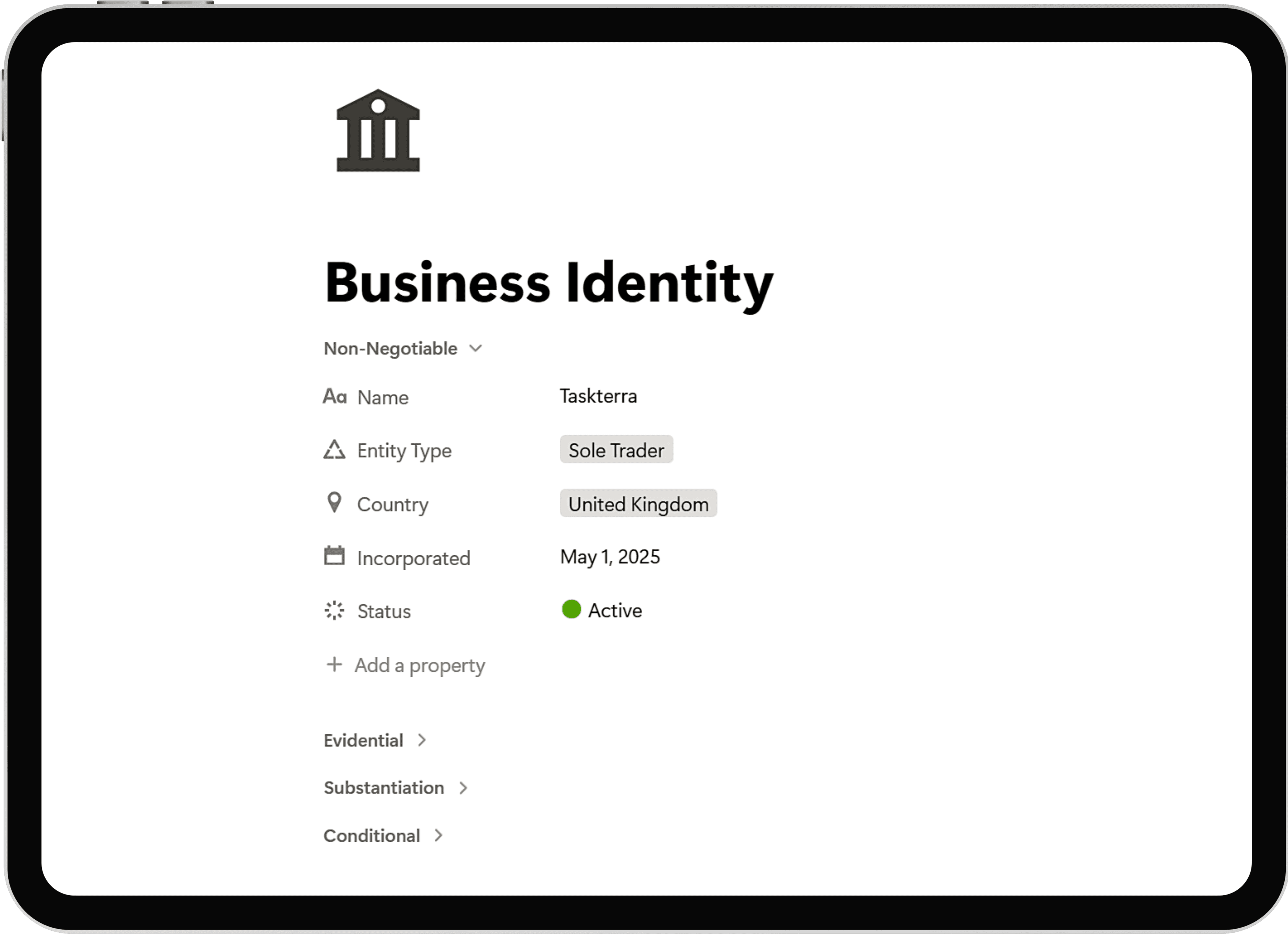 Business Identity in Notion showing the non-negotiable business details, presented on a tablet.