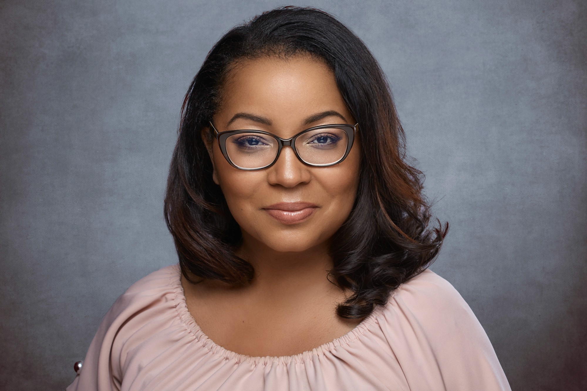 Epic Founder portrait of a man wearing a blue button up shirt , representing the definitive boardroom authority look. Professional LinkedIn photo package.