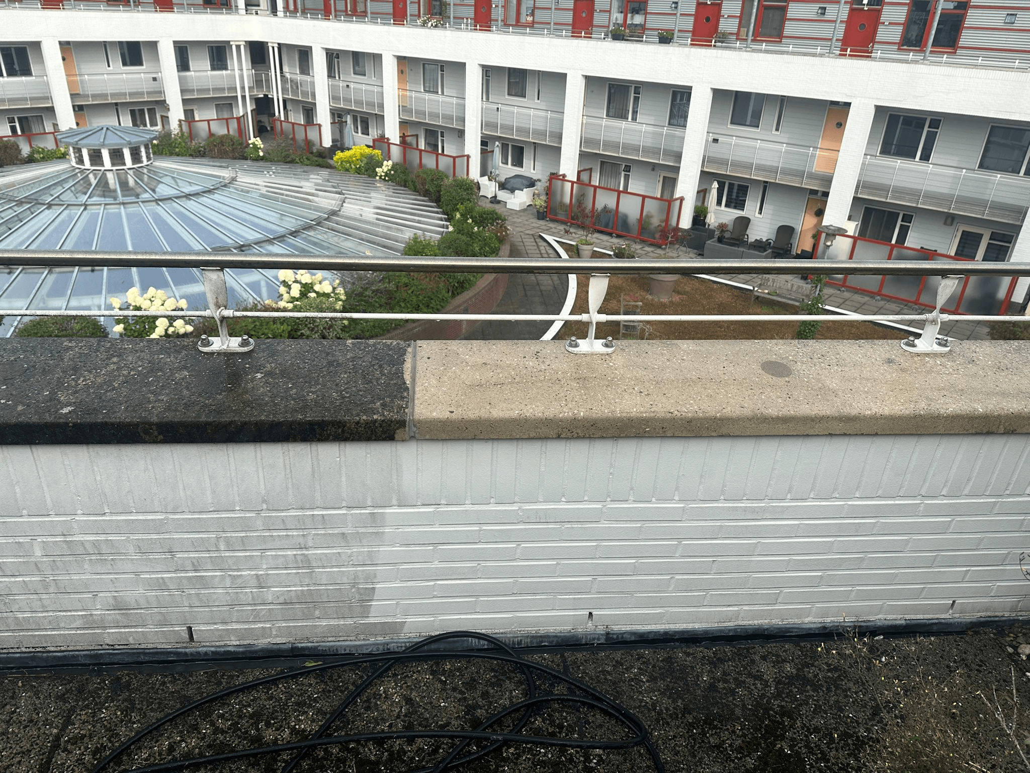 a black and white living room with a large tv