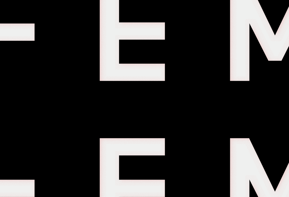 The image shows three white letters on a black background. From left to right, the letters are E, M, and N. The letters are centered and appear to be in a sans-serif font.