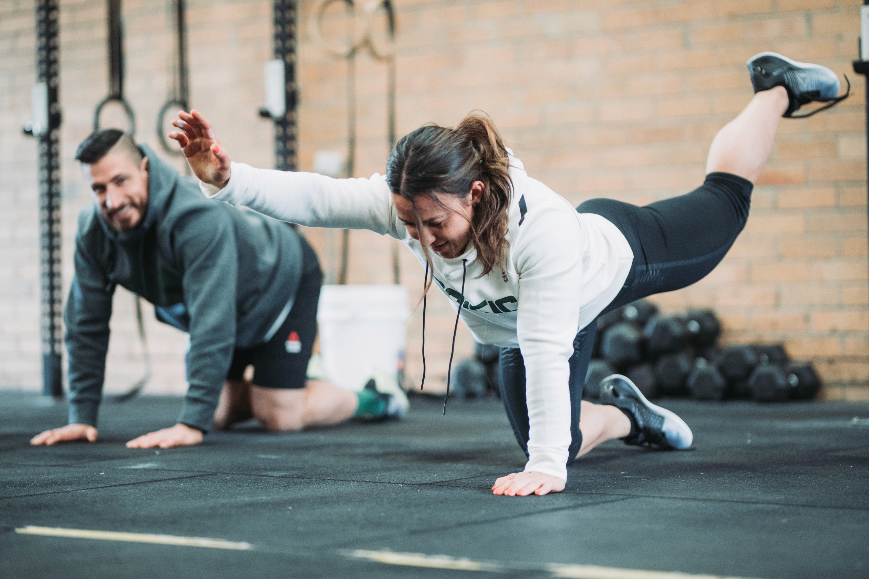 person stretching - Exercises That Improve Muscular Endurance