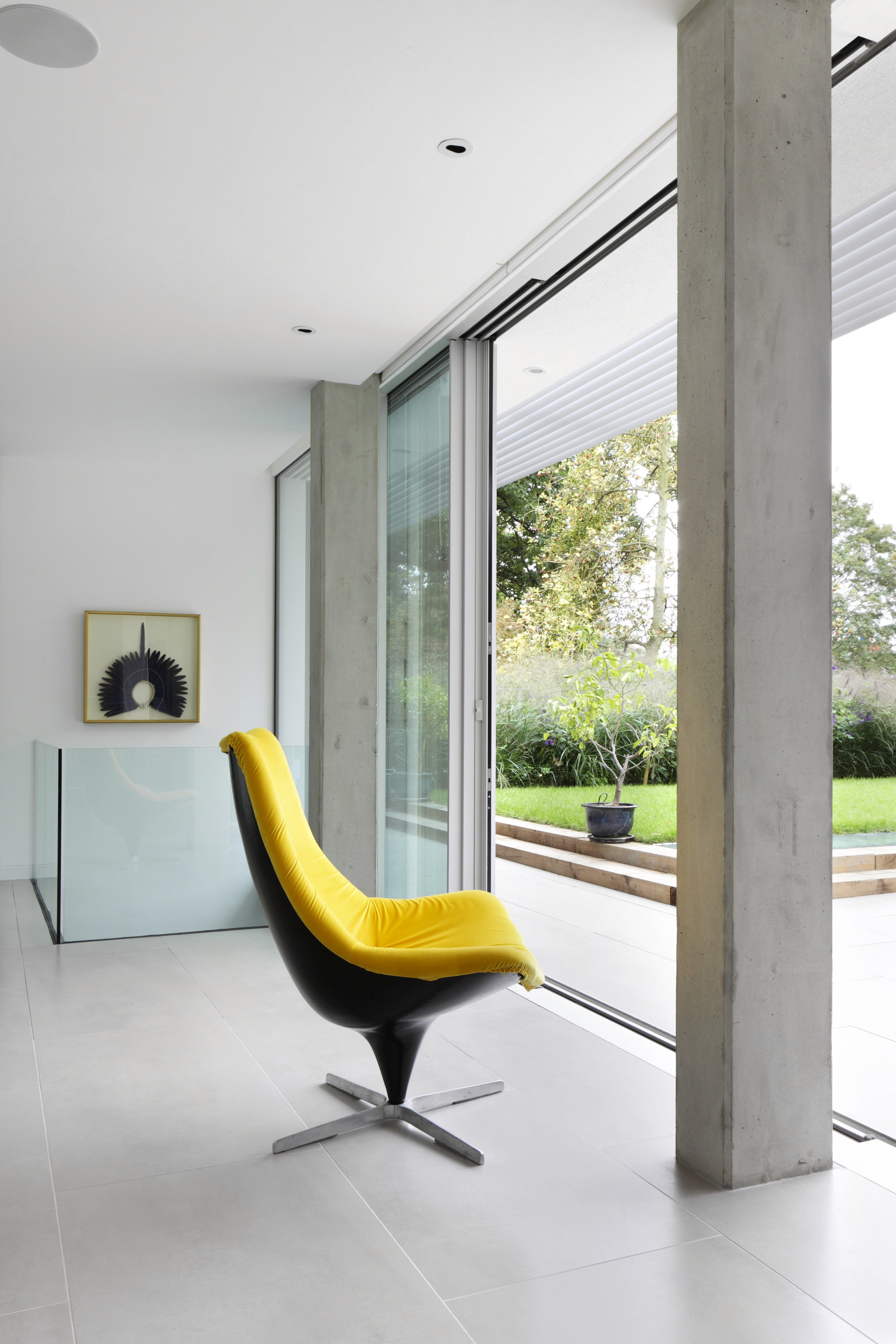 Yellow chair in Bespoke kitchen handcrafted by Chamber Furniture, Blackheath, London