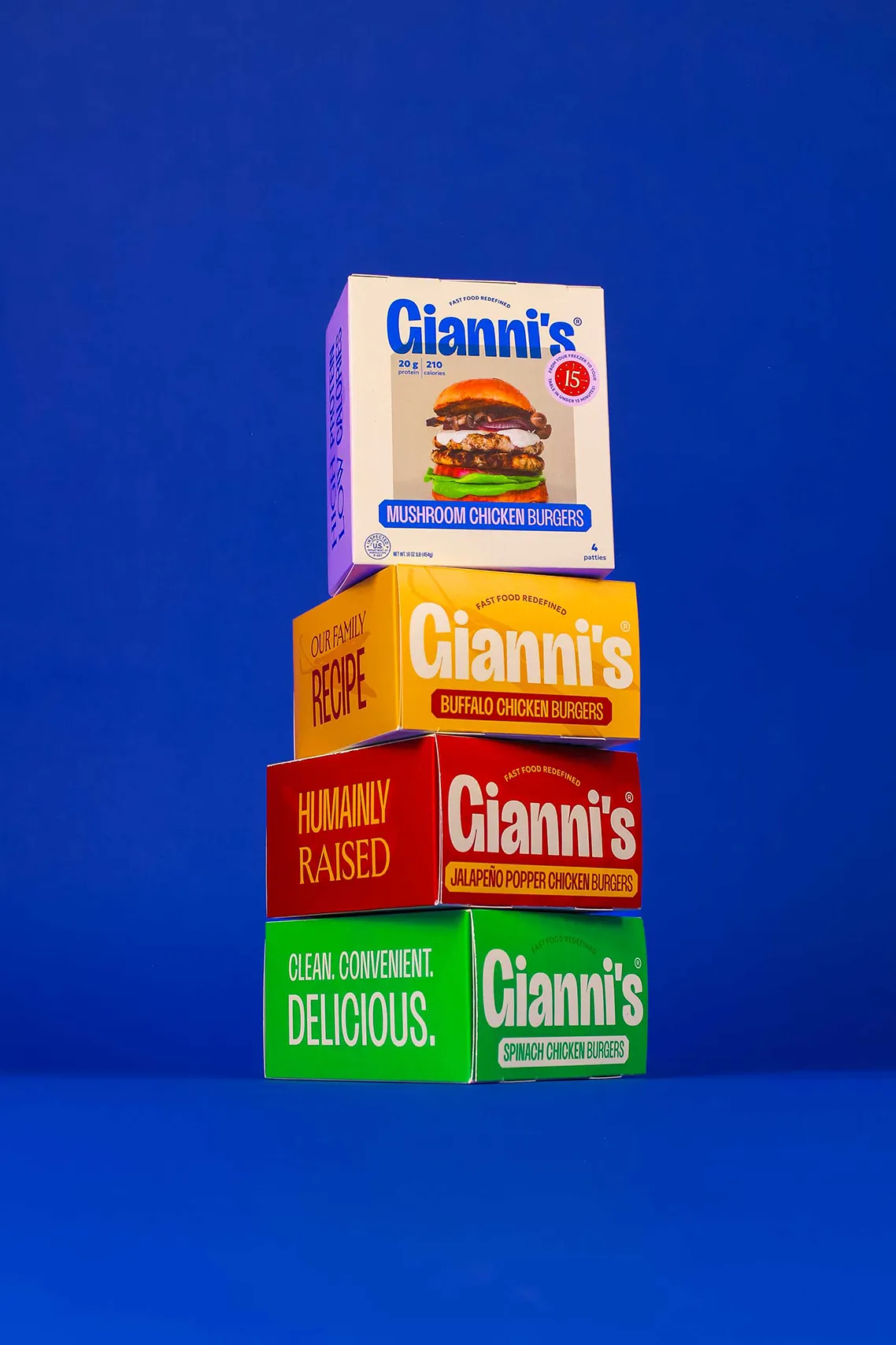 Colorful Gianni’s chicken burger packages stacked vertically on a blue background