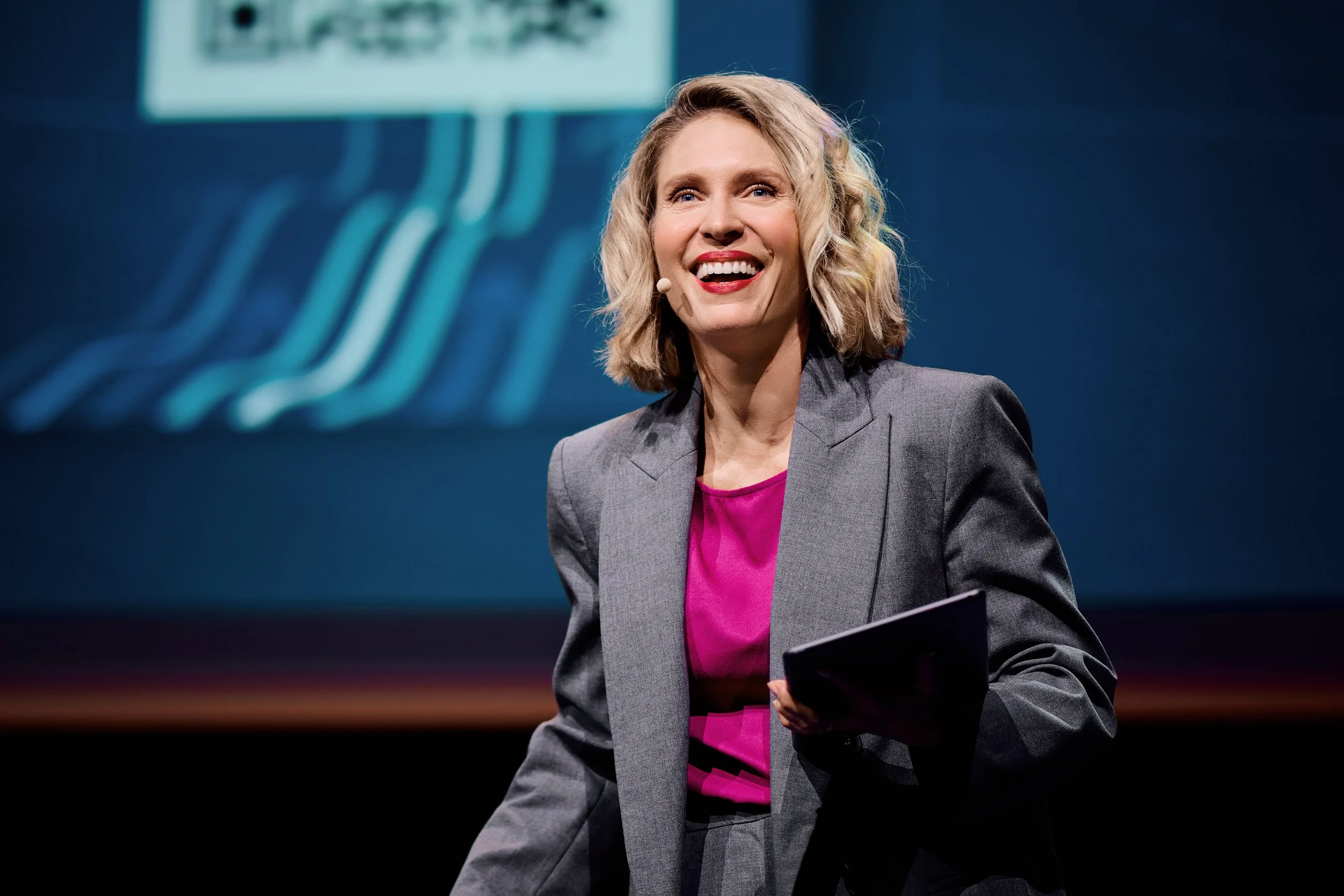 A person in motion, silhouetted against a light background. Blurred movement creates a dynamic, ethereal effect, conveying energy and fluidity.