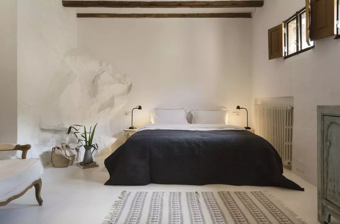 Streetside billboard with flyposters of the Batch.Works brand and illustrations