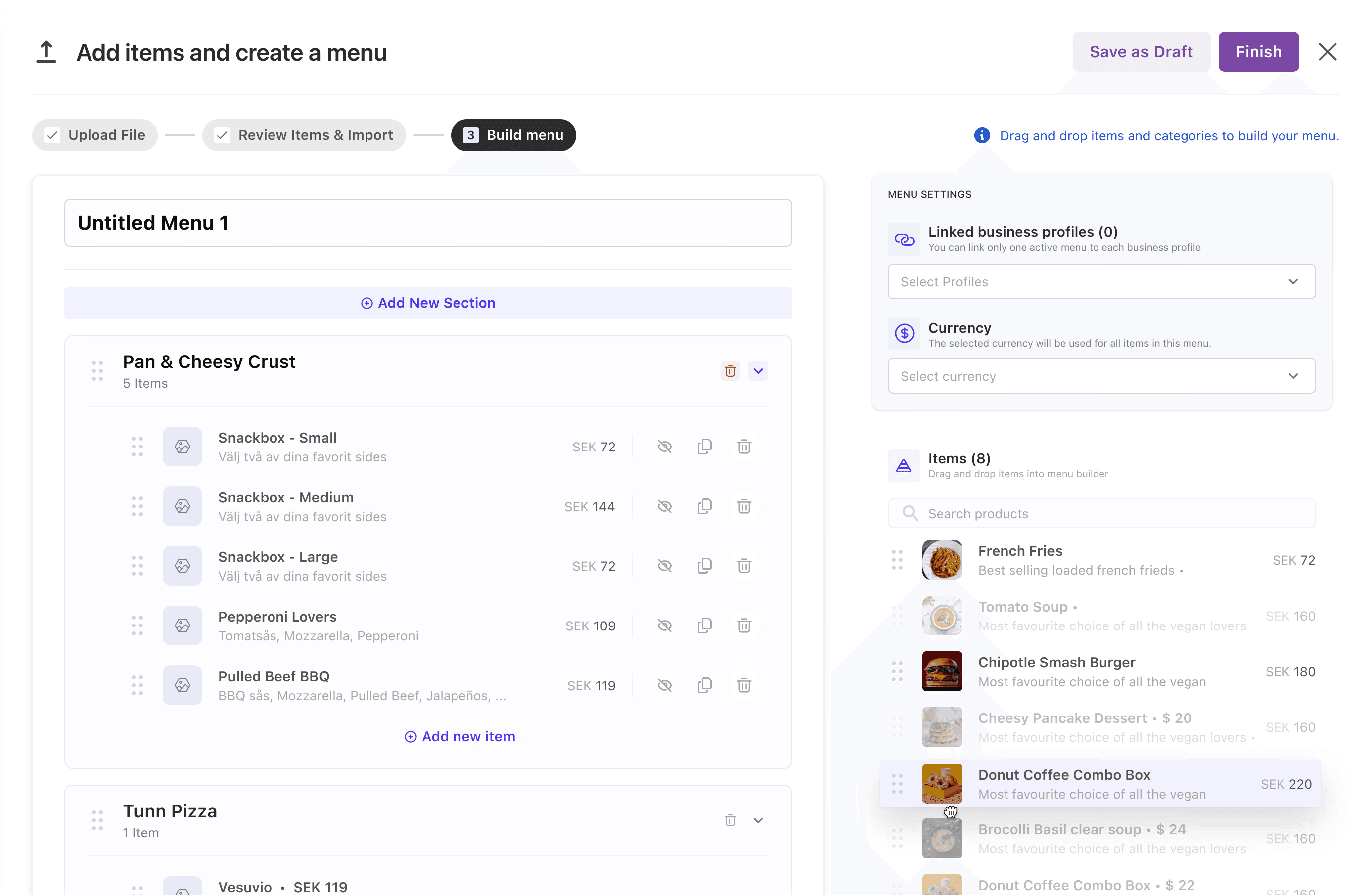 man standing beside table while holding food