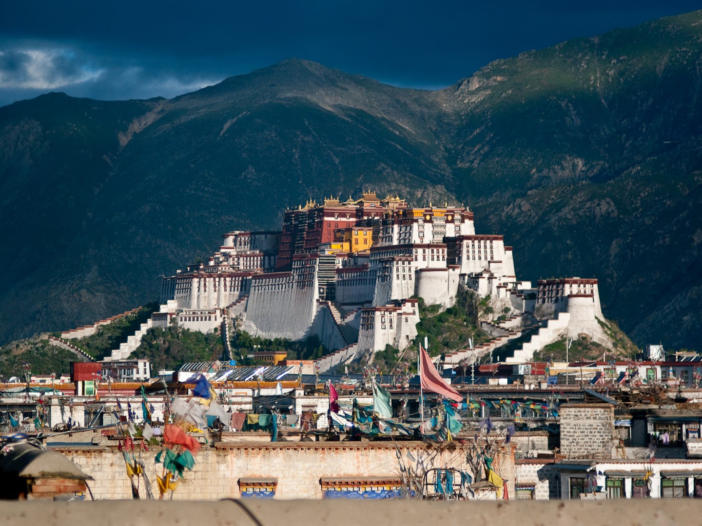 The potala palace stands majestically in the distance.