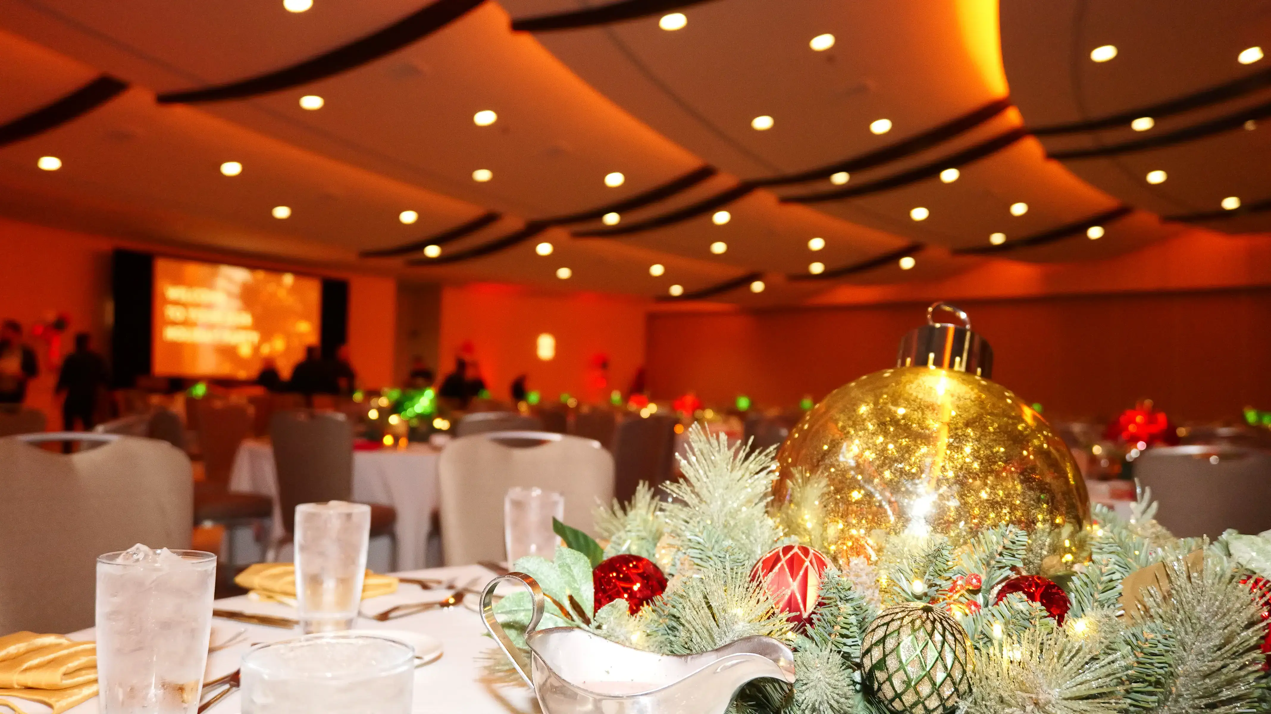 holiday party ballroom with closeup of table decor