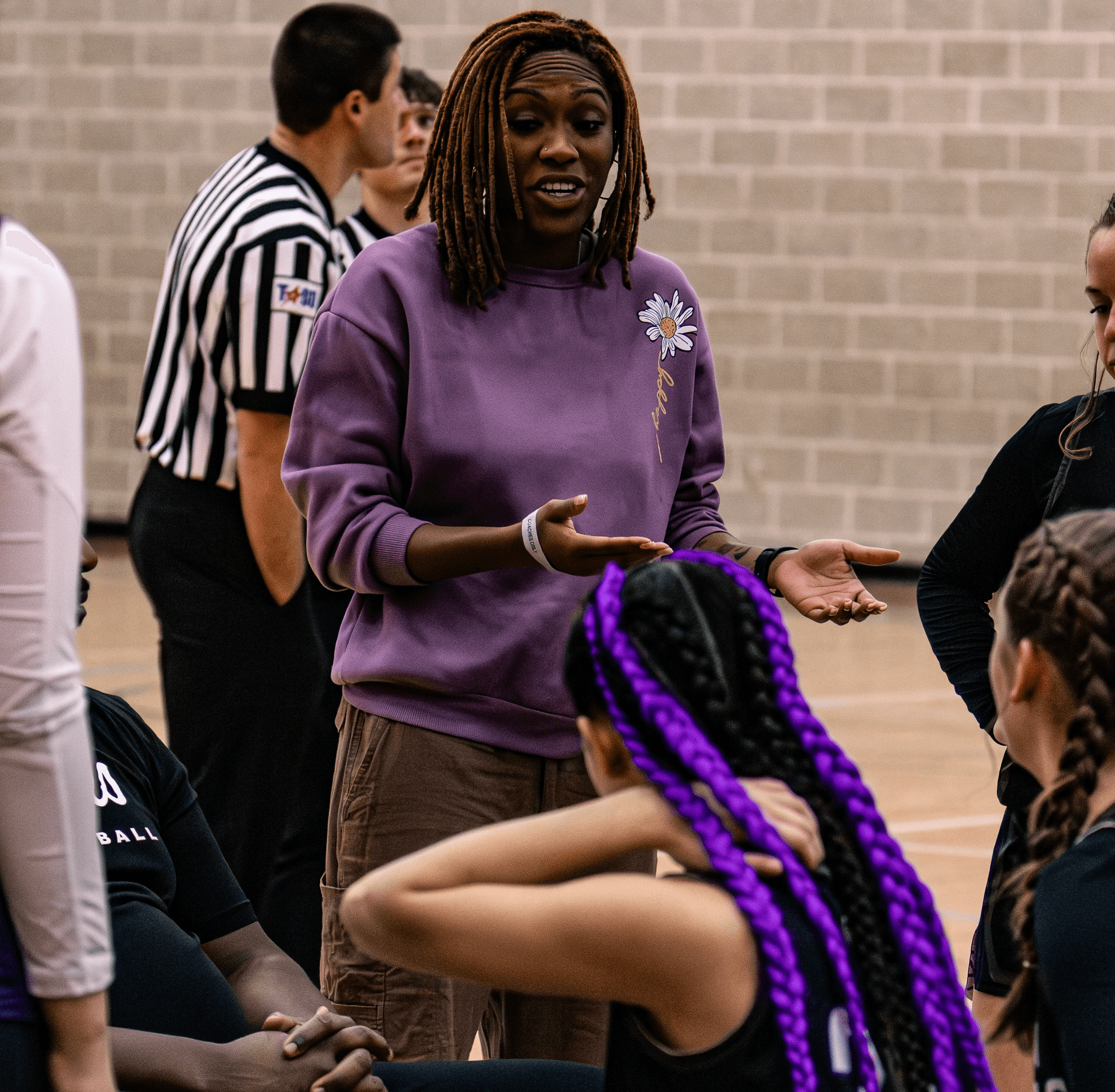 Rachel Stone standing with ABS and hands in her pockets