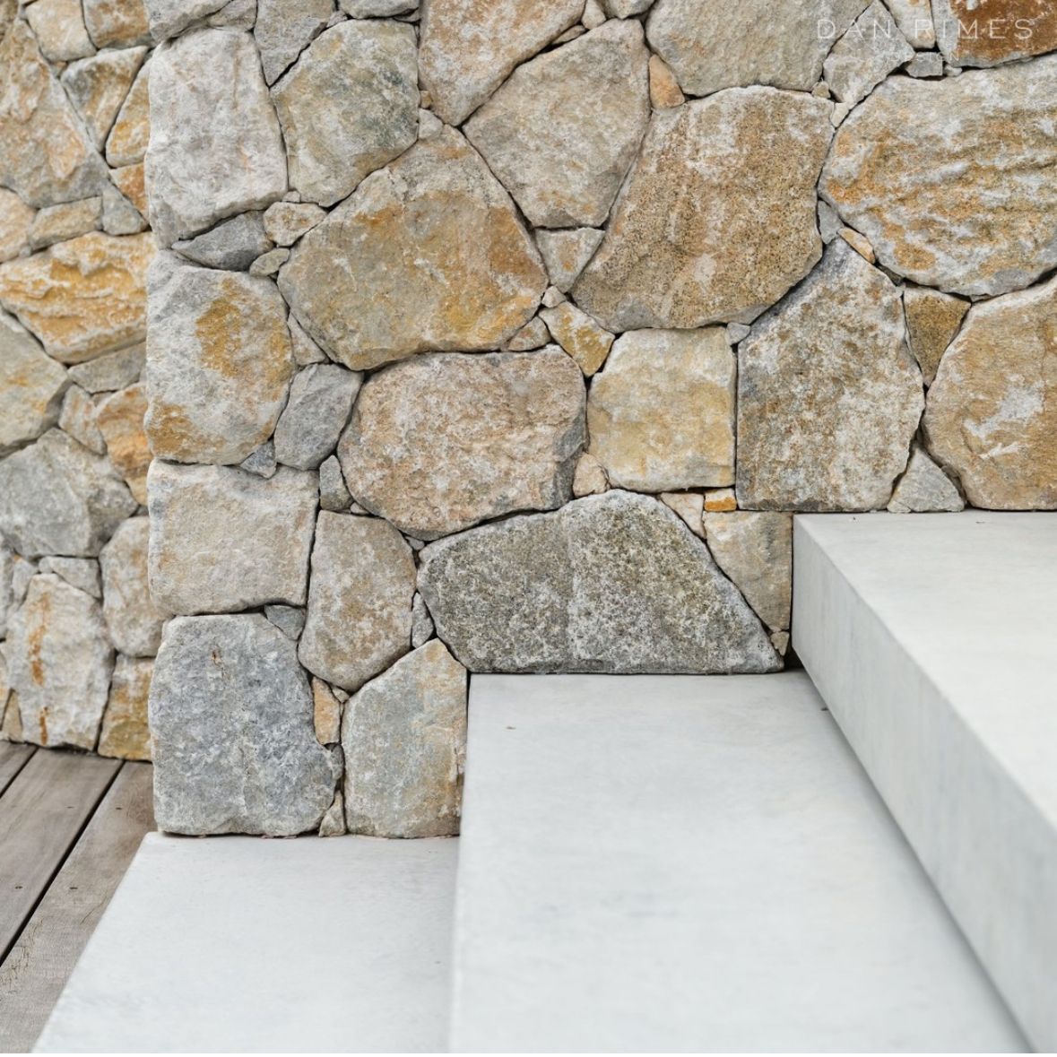 Woman by the sea with waves splashing