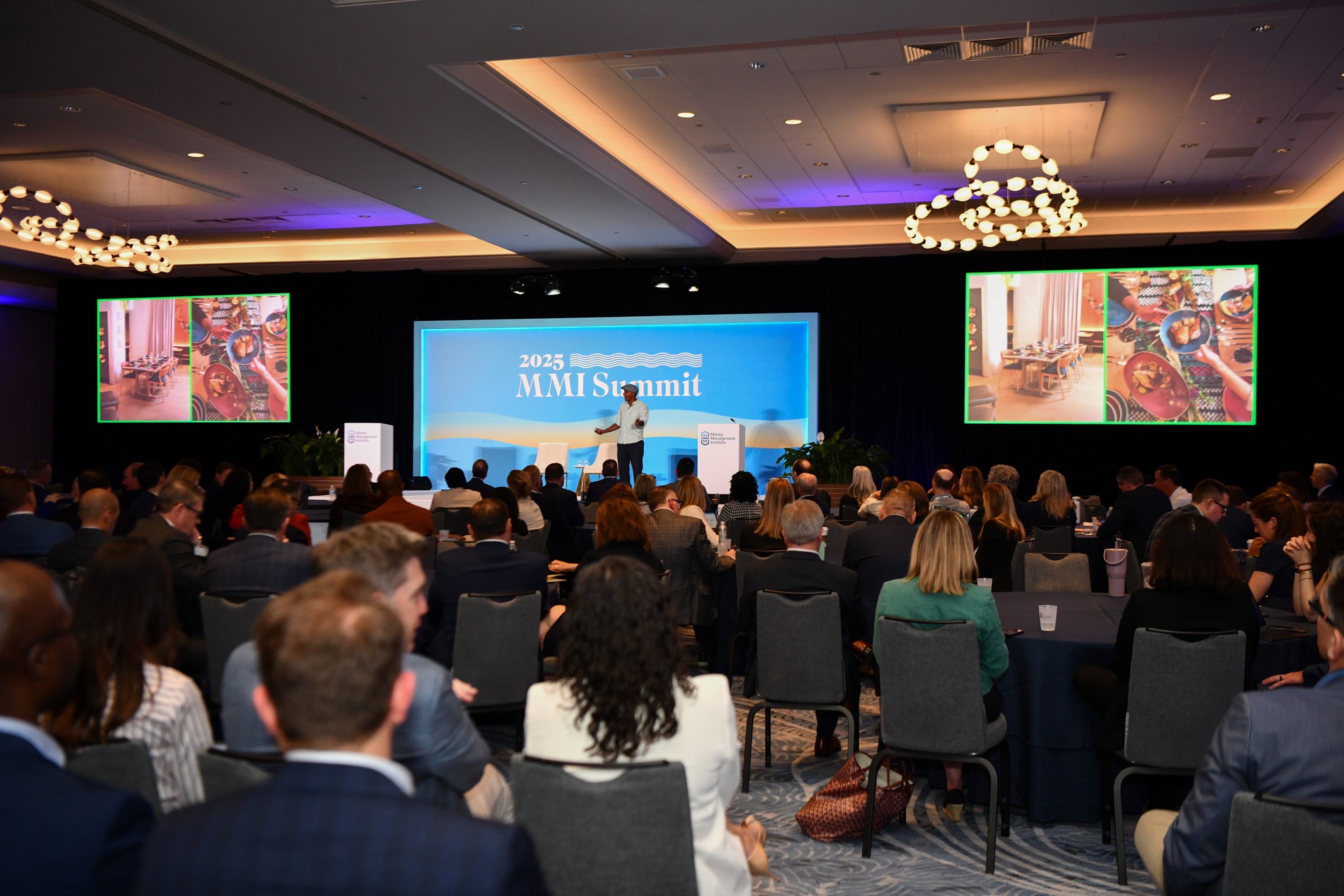 2025 MMI Summit wide view of stage and audience with one speaker