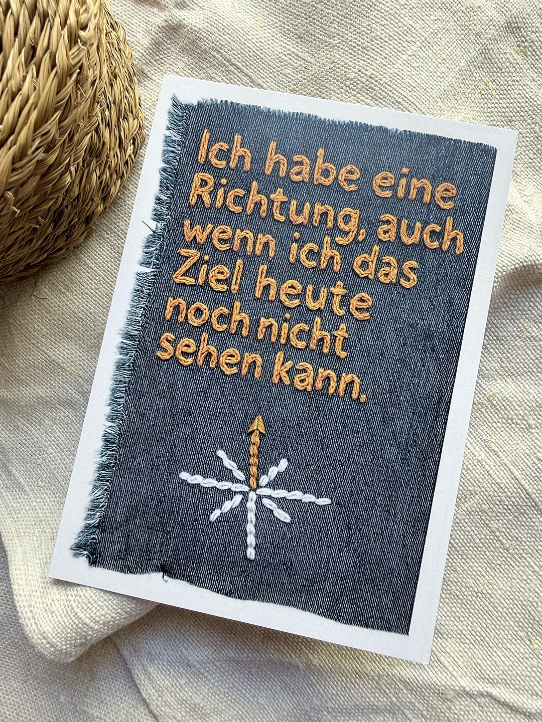 A Card with a embroidered Text