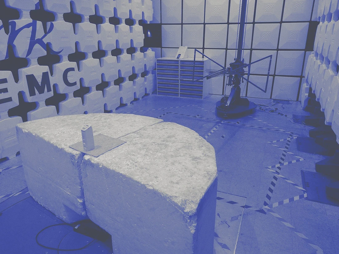 Medical device undergoing EMC testing in anechoic chamber, demonstrating regulatory compliance and electromagnetic compatibility validation.