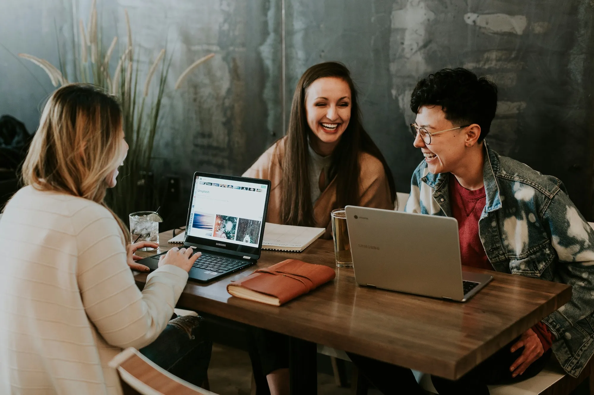 A group of happy employees working on a project 