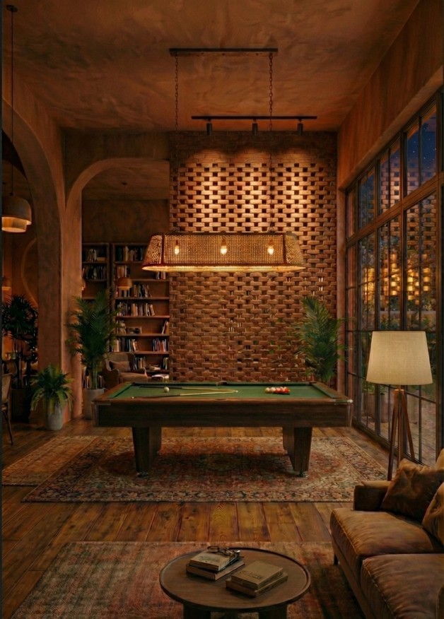 living room area with coffee table and green velvet sofa