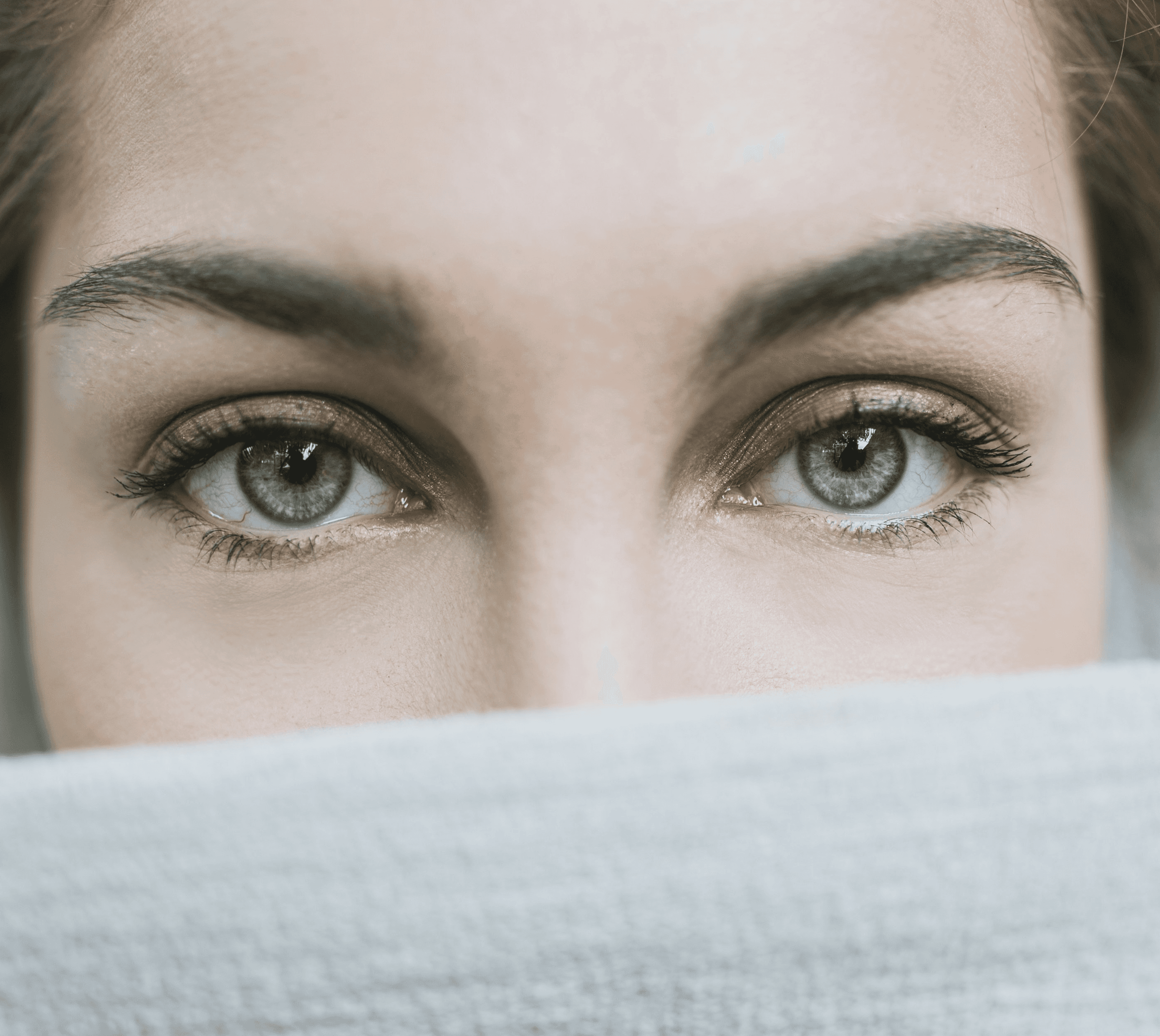 woman covered with white textile