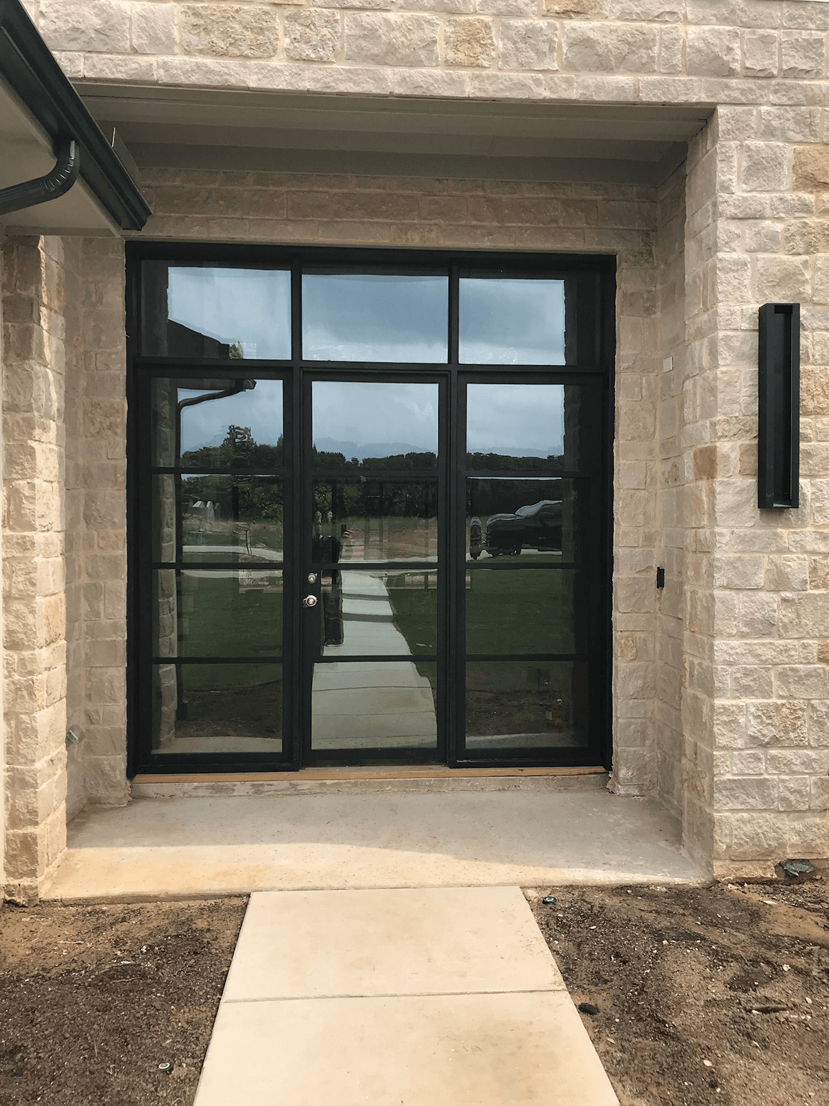 Traditional wrought iron double doors by M2 Metals Iron Doors DFW