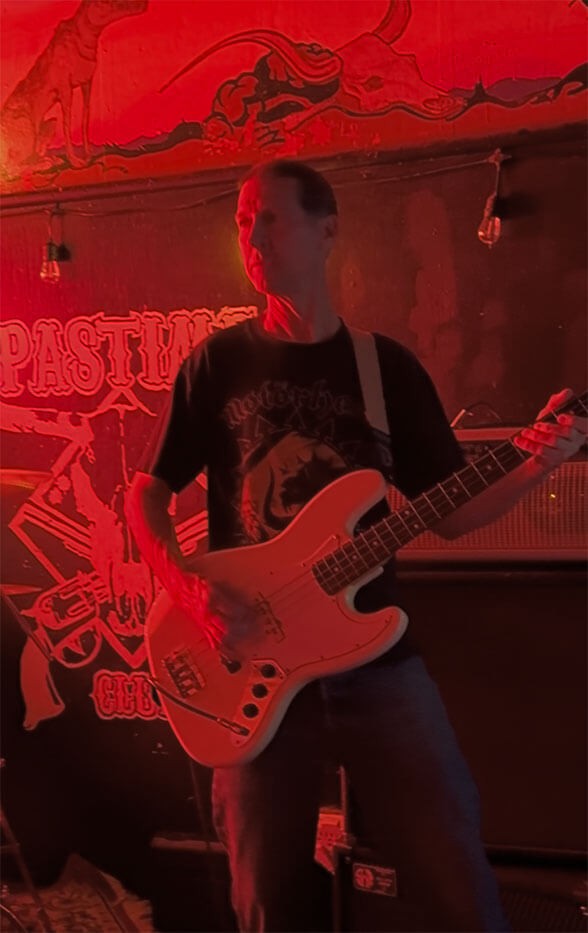 Gary Boodt on bass guitar at The Pastime Club.