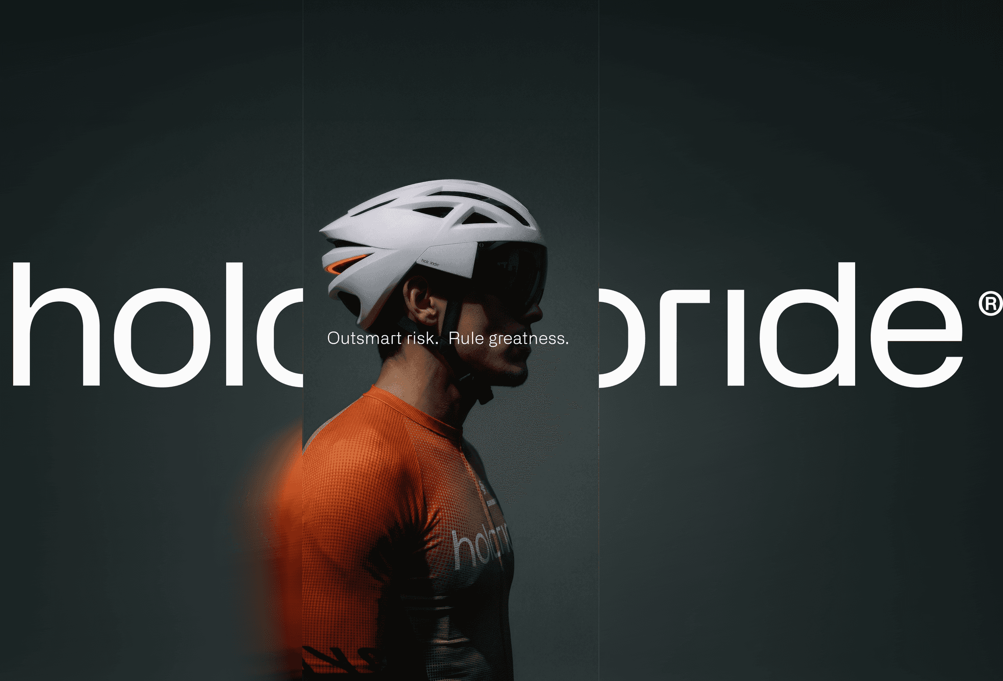 Holoride branding, cyclist wearing holoride helmet and branded jersey
