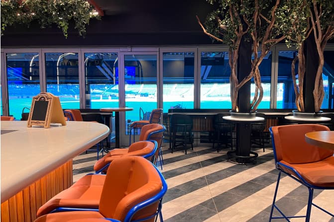 A close shot of the chairs at the bar