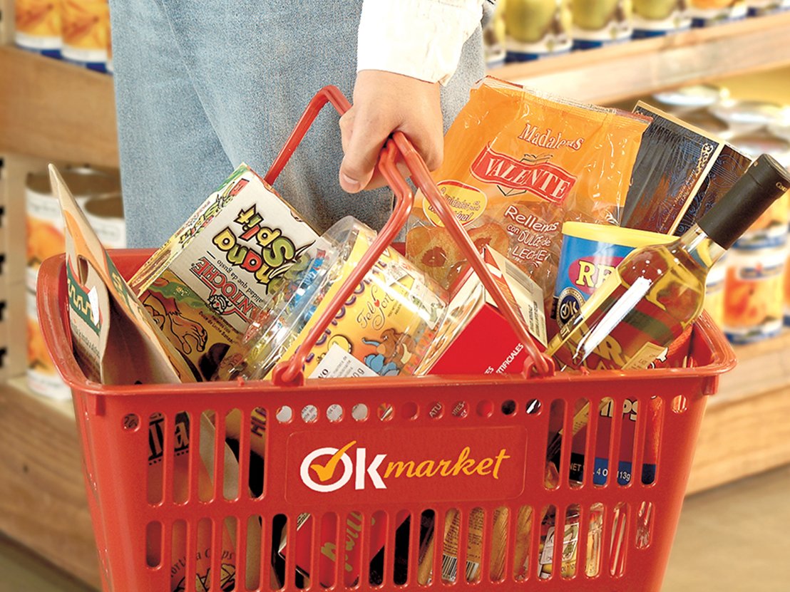 Rooftops of a coastal town with the sea in background